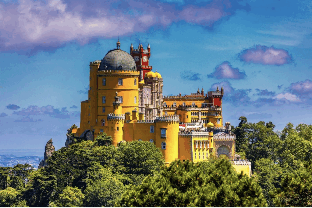 The yellow and red Pena Palace in Sintra, Portugal on a sunny day