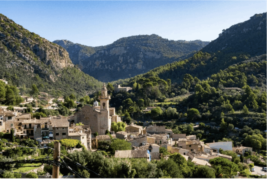 A small town tucked between mountains in Mallorca, one of the Balearic Islands